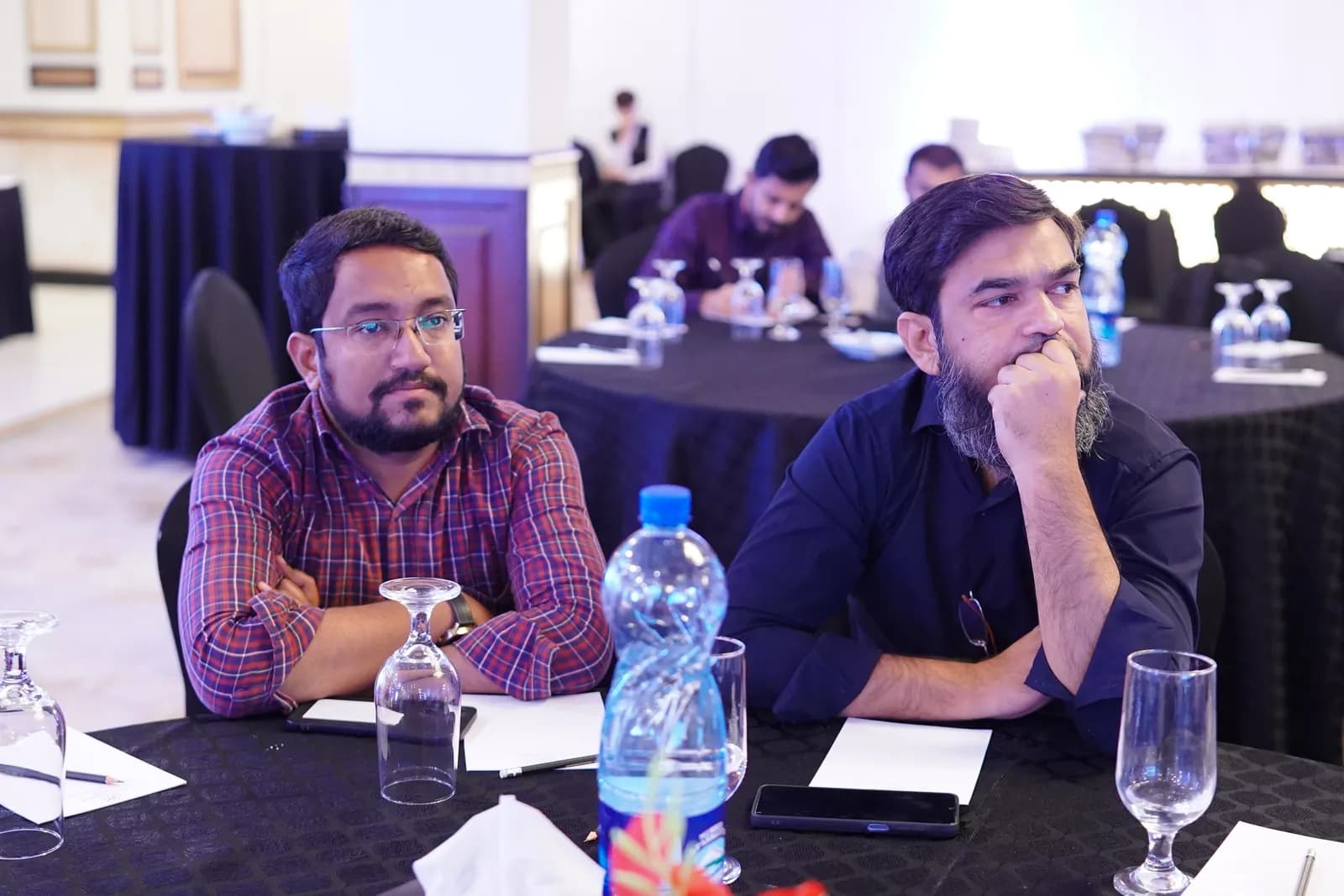 Attendees listening to an expert-led session